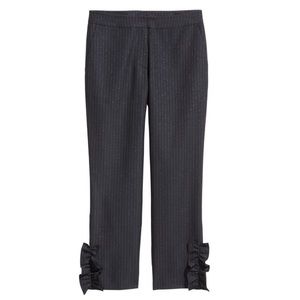 HM Dark Blue pinstripe pants with ruffle on bottom putter sides.
